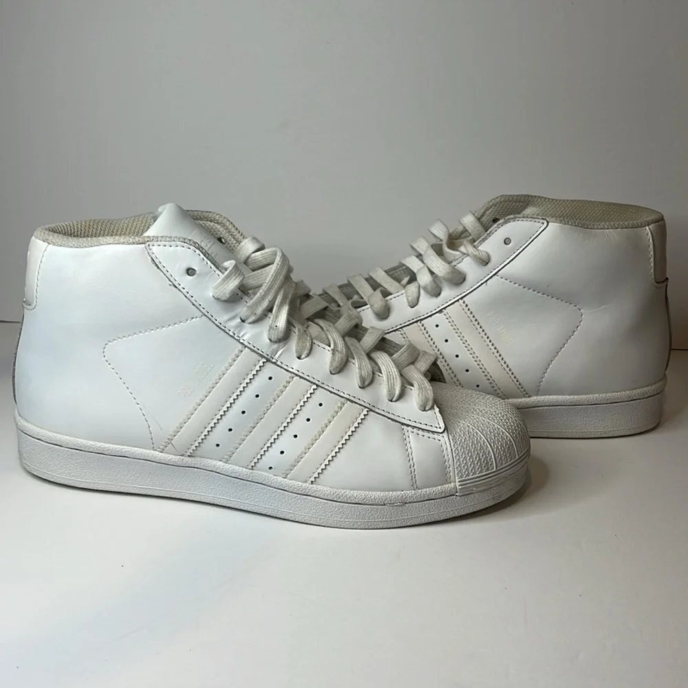 - Adidas White Pro Model High Top Sneakers